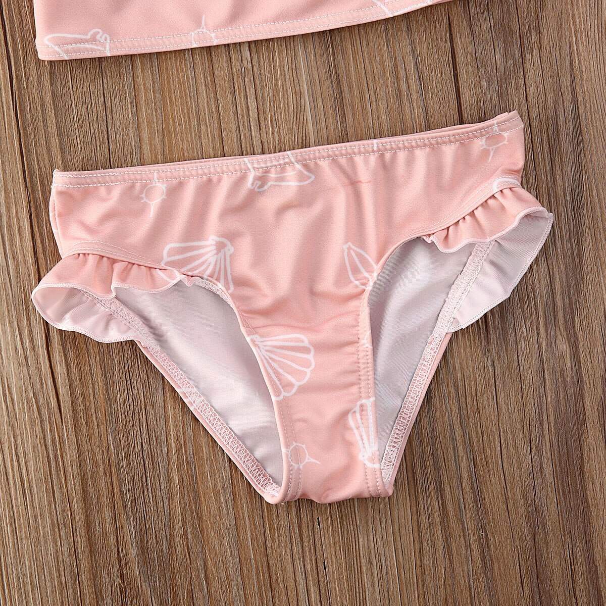 Dwuczęściowy strój kąpielowy w muszelki dla dziewczynki