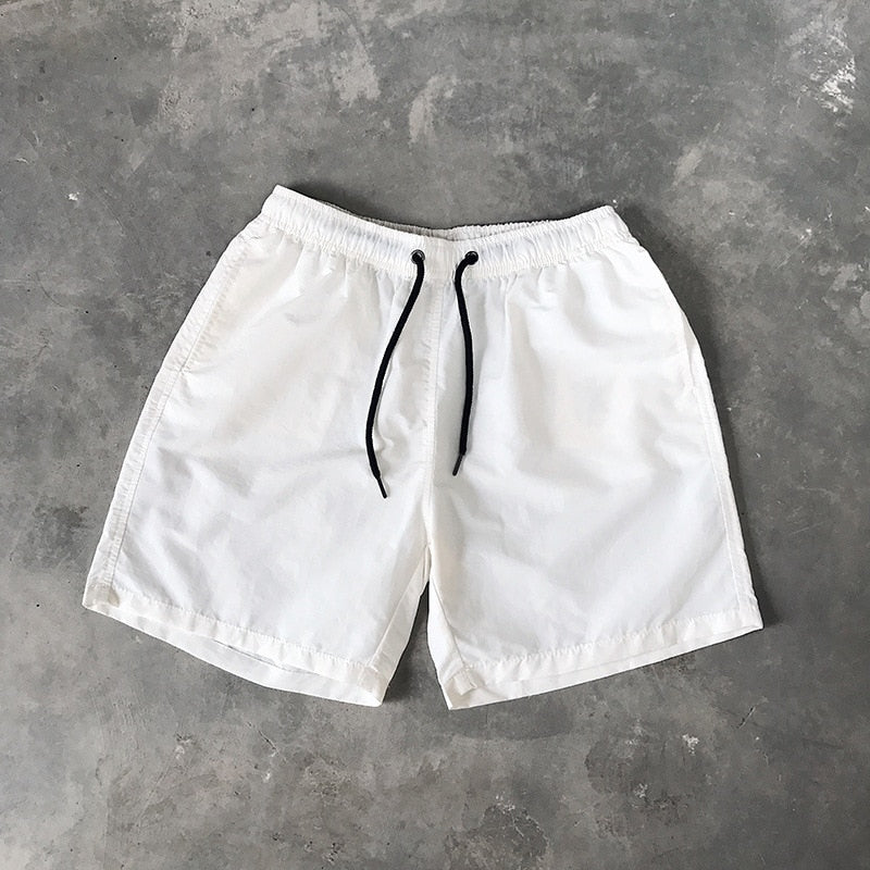 Męskie szorty kąpielowe w jednolitym kolorze - Biały / S