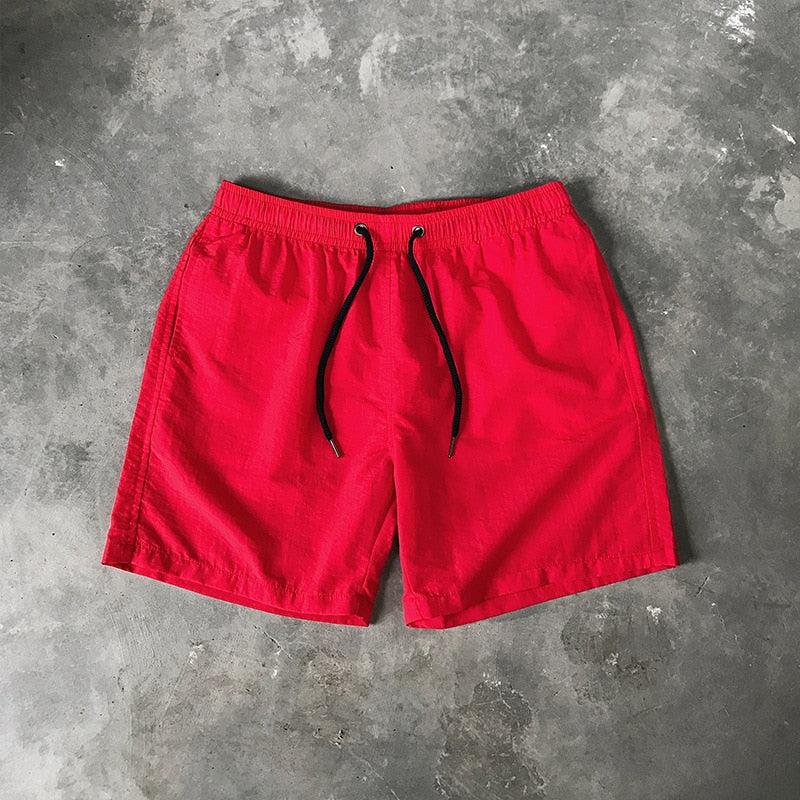 Męskie szorty kąpielowe w jednolitym kolorze - Czerwony / S