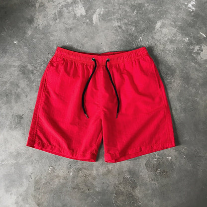Męskie szorty kąpielowe w jednolitym kolorze - Czerwony / S