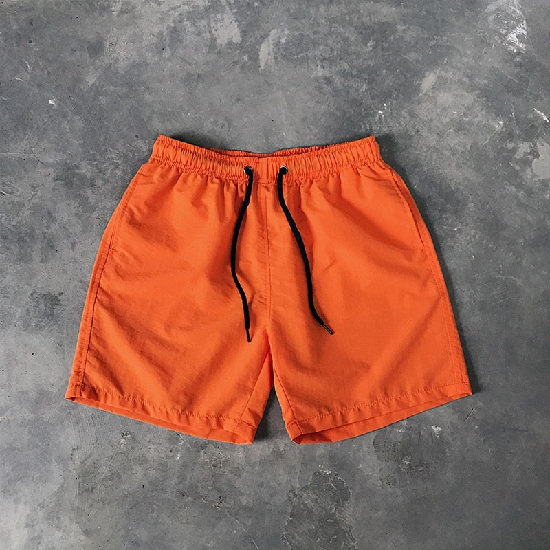 Męskie szorty kąpielowe w jednolitym kolorze - Pomarańczowy / S