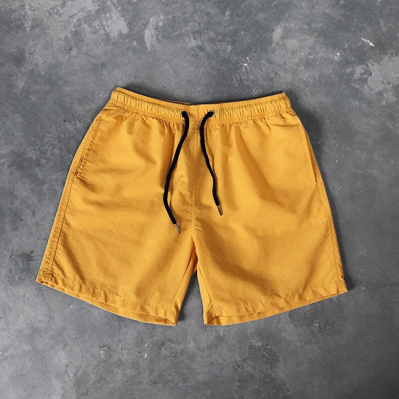 Męskie szorty kąpielowe w jednolitym kolorze - Żółty / S