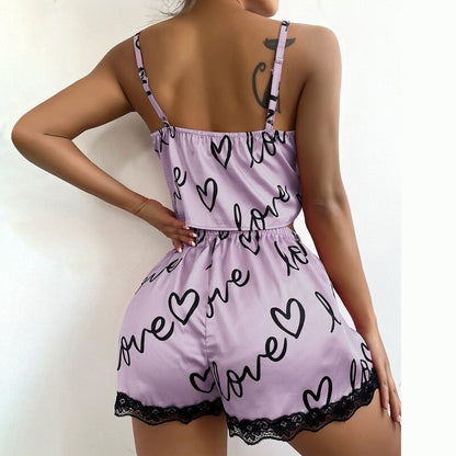 Satynowa piżama damska z nadrukiem serc i napisem love