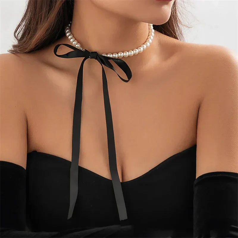 Choker perełkowy z kokardką