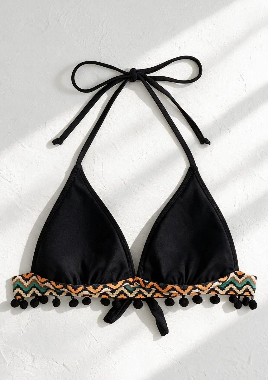 Biustonosz kąpielowy wiązany na szyi z pomponami
