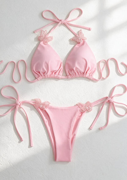 Różowy dwuczęściowy strój kąpielowy bikini z motylkami