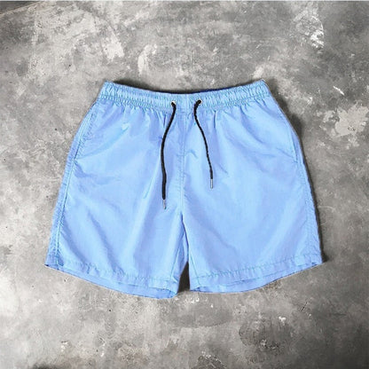 Męskie szorty kąpielowe w jednolitym kolorze Ian - Błękitny / S